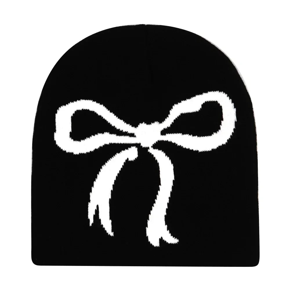 Black knit hat with a prominent white bow design warm beanies women ideal for skiing beanie outdoor use