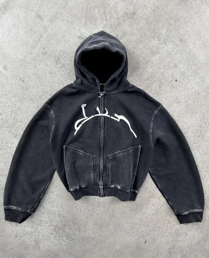 Black zip-up hoodie with white abstract graphic on chest and front pockets in harajuku hip hop style fashion