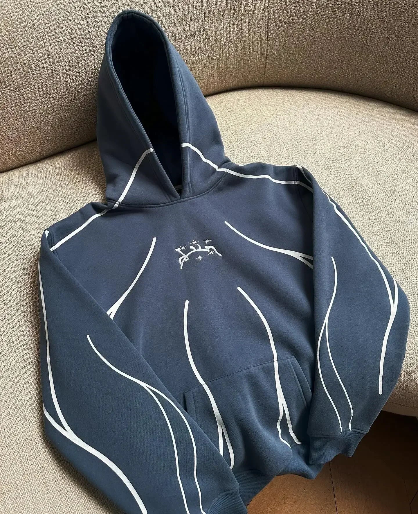 Dark blue hoodie with white stitched lines and small embroidered logo perfect for harajuku hip hop fashion