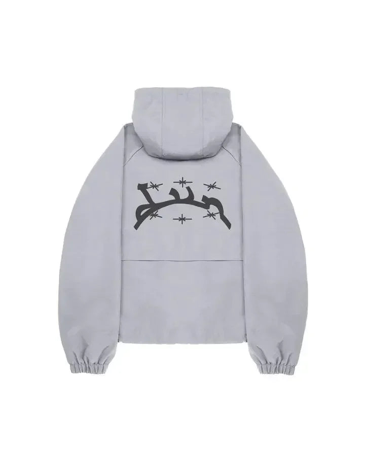 Back side of a light gray hooded jacket with black barbed wire and star graphic for harajuku hip hop fashion