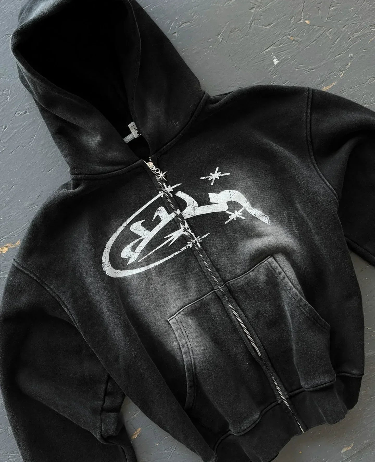 Black zip-up hoodie with white distressed stars and abstract graphic print for harajuku hip hop casual wear