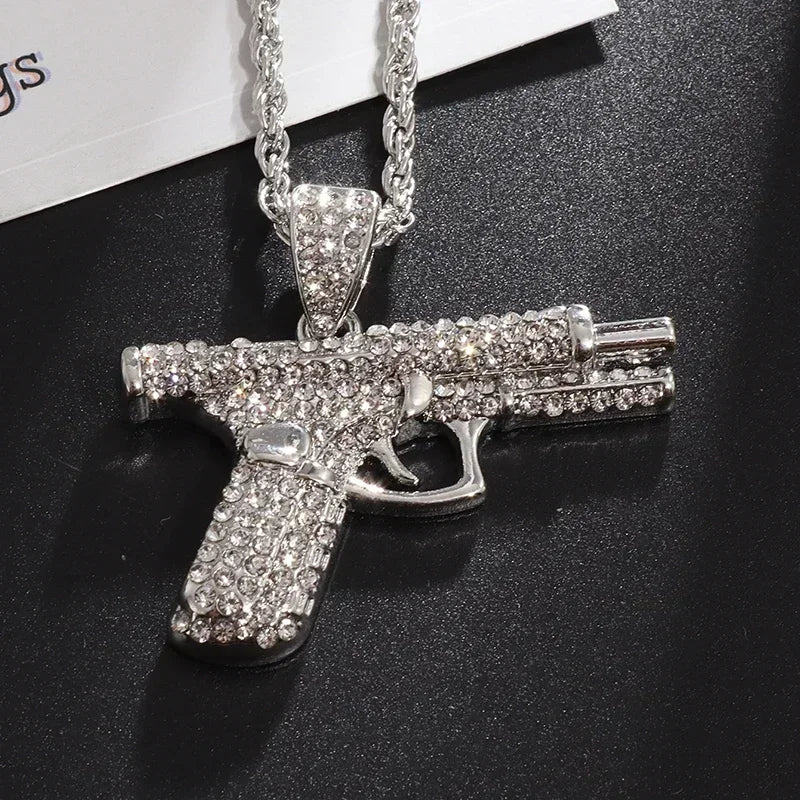 Silver gun-shaped savage pendant cubic necklace adorned with sparkling clear cubic zirconia for rap party jewelry