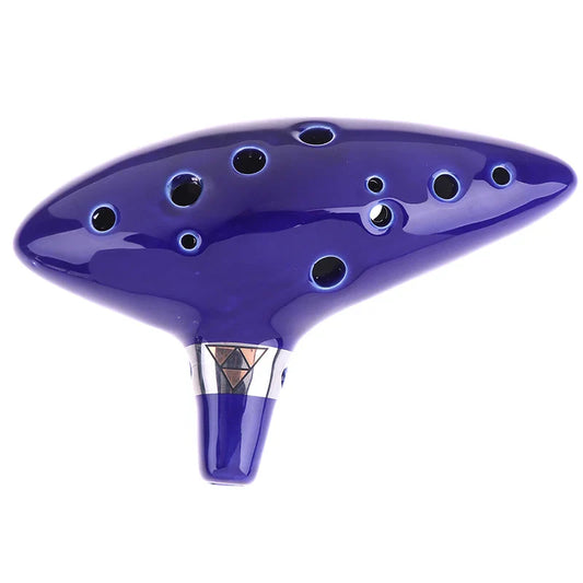 A glossy royal blue ceramic ocarina flute with 12 circular finger holes inspired by the legend of ocarina of time