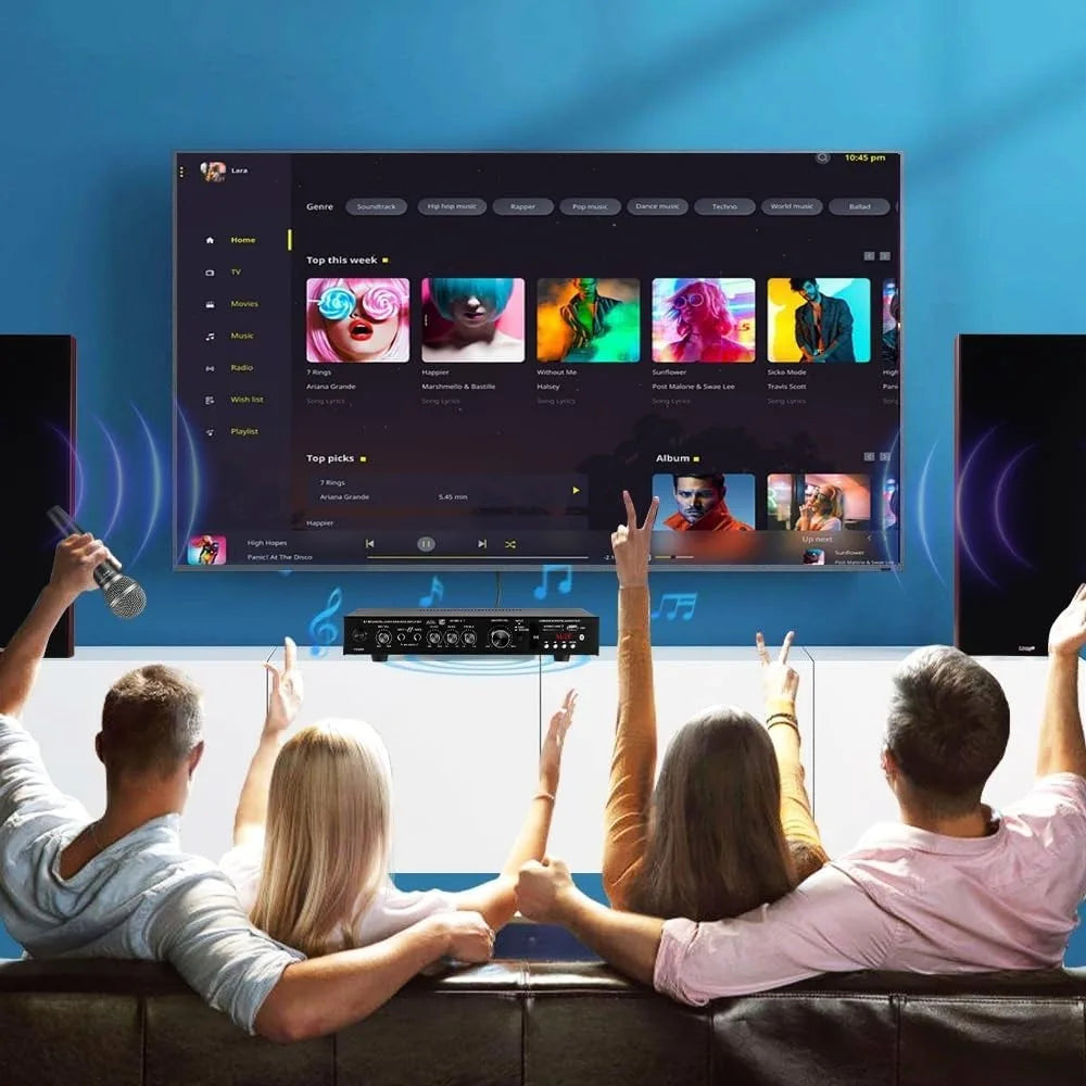 Black rectangular stereo audio amplifier receiver with control knobs below tv for 6 channel home theater use