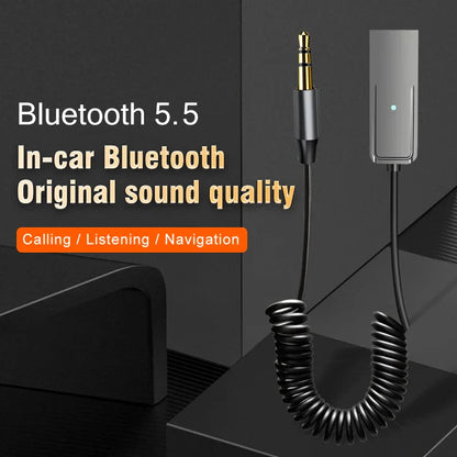 Black coiled cable with gold tip 3.5mm audio plug and silver bluetooth receiver with green led for car aux wireless adapter stereo and car bt transmit