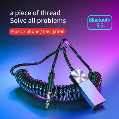 A sleek metallic silver bluetooth 5.5 wireless adapter stereo with coiled cable and 3.5mm jack for car aux wireless use