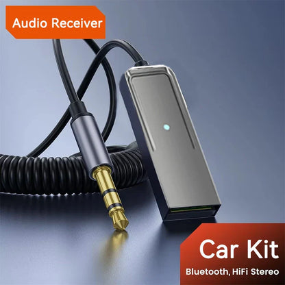Silver rectangular bluetooth 5.5 car kit aux audio receiver with mic wireless adapter transmit and glowing green indicator light
