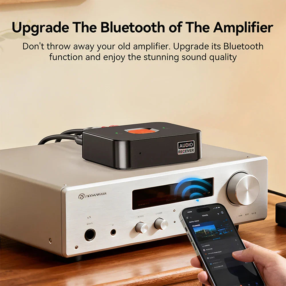 Black audio receiver with orange button and silver label on silver amplifier wireless adapter aux jack rca for home speaker amplifier