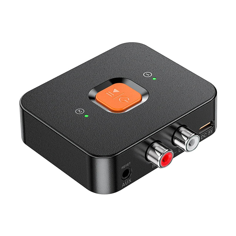 Black rectangular wireless adapter with orange power button and silver aux jack rca for home speaker amplifier use