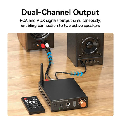 Black bluetooth-compatible 6.0 music wireless adapter with copper volume knob connected to powered speakers amplifiers