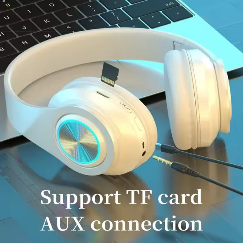 White over-ear bluetooth headphones rgb with glowing blue accent aux cable cancellation foldable headset tf music player