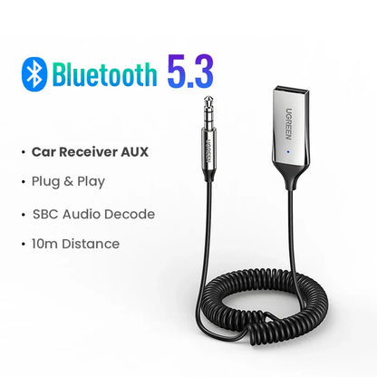 Silver Ugreen bluetooth 5.3 car bt transmitter adapter with coiled black cable and metallic 3.5mm jack music wireless kit aux audio