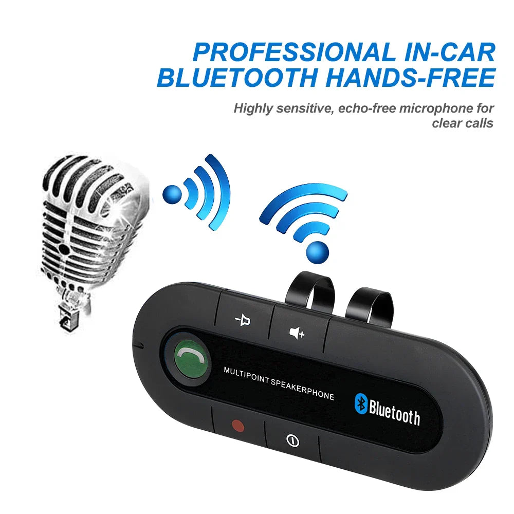 Black plastic bluetooth speaker handsfree with green call button and visor clip wireless audio receiver for car use
