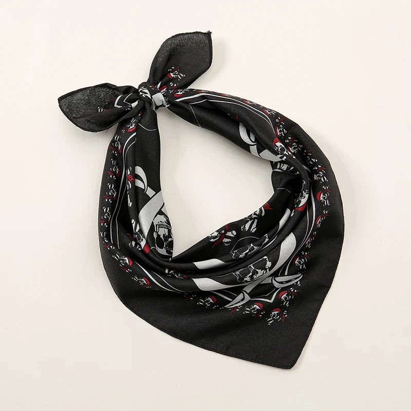 Black silk bohemian print bandana with bold white and red skull pattern tied in a knot printed headbands hiphop wrist wraps face mask