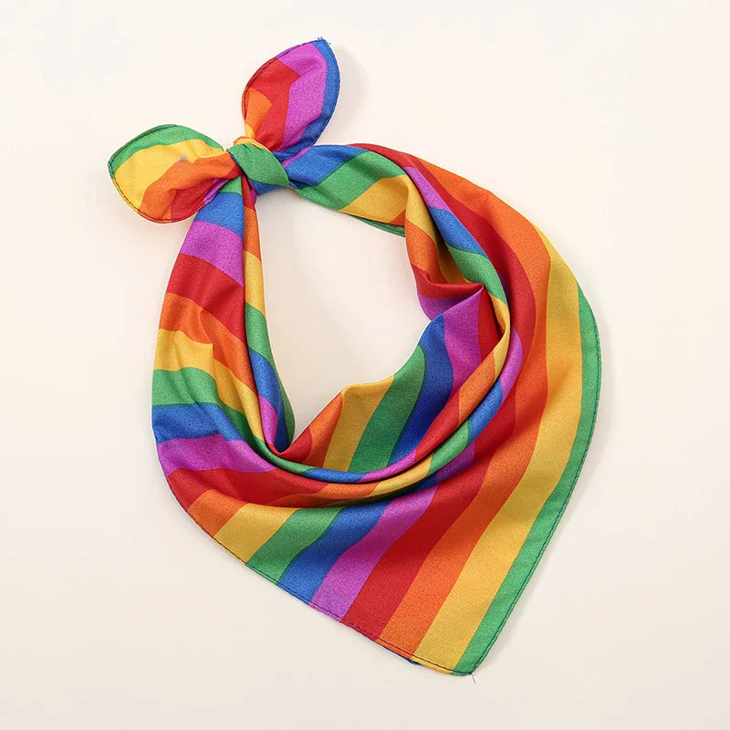 A vibrant rainbow-striped bohemian print bandana made of smooth satin fabric, perfect as printed headbands hiphop and wrist wraps face