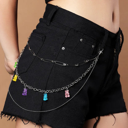 A multi-layered silver waist chain multicolor with bohemian rainbow resin gummy bear charms and acrylic flower details