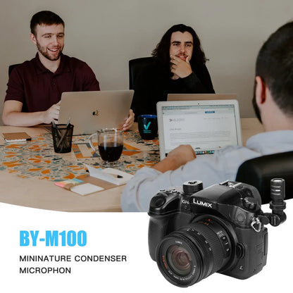 Black lumix gh1 camera with mounted black boya by-m100 wired condenser microphone featuring a-weighted curve frequency response