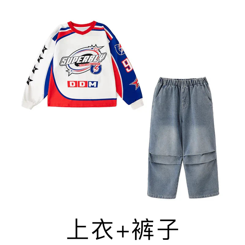 Boys pullover oversize shirt in white red and blue with superball graphic paired with light wash denim shorts for hip hop streetwear