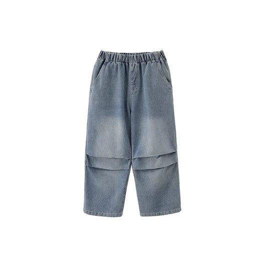 Light blue denim shorts with elastic waistband and layered boxy pockets paired with hip hop streetwear cargo pants girls style
