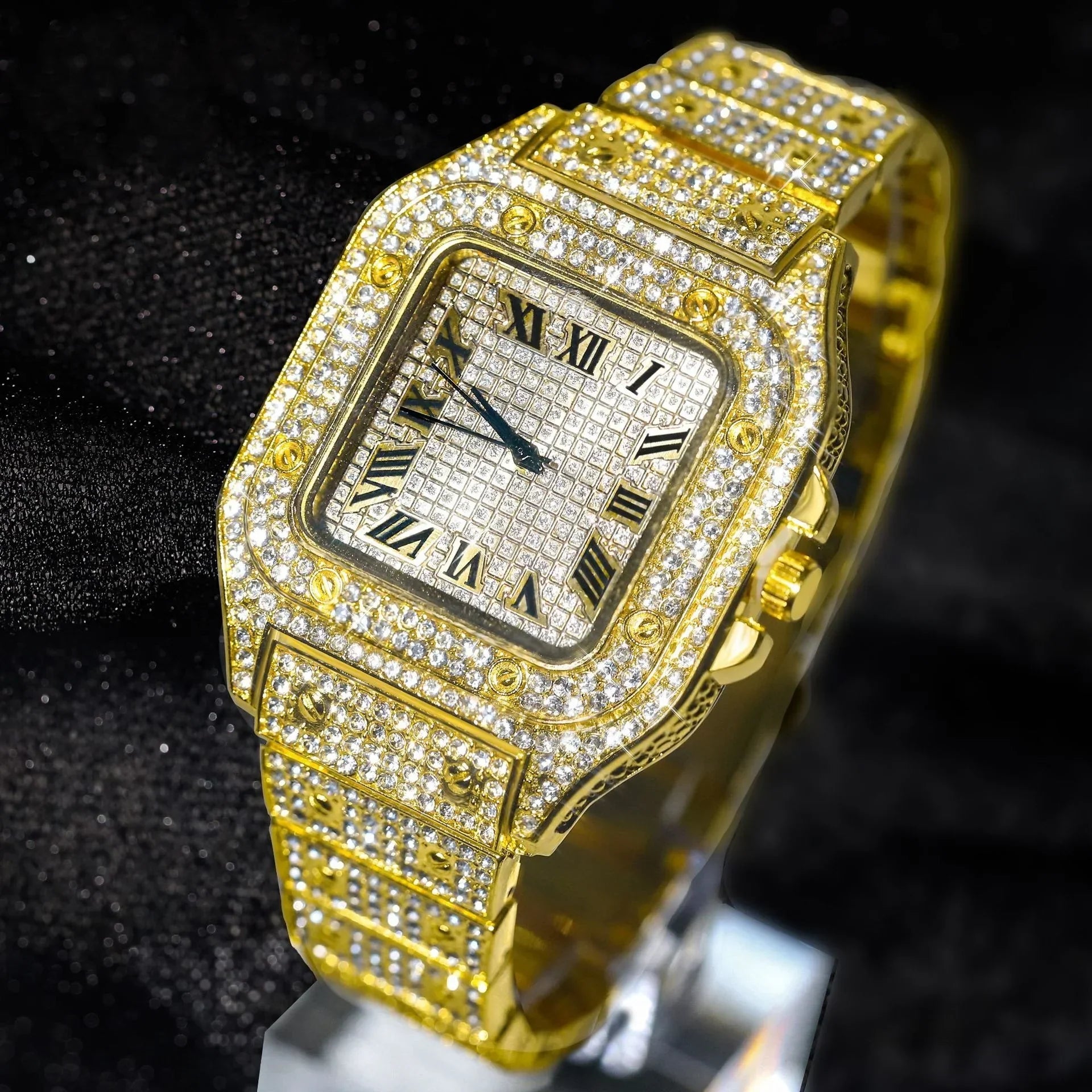A dazzling gold date quartz watch with a square face and stylish alloy strap featuring hip hop diamond accents