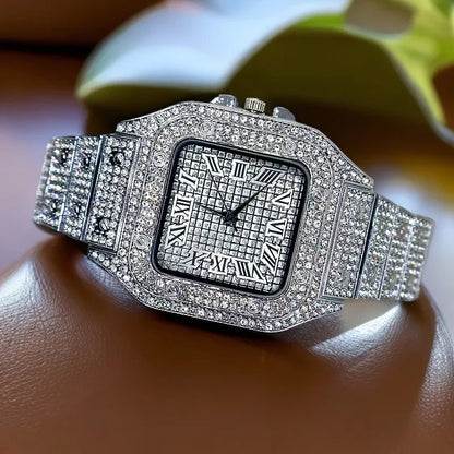 A dazzling square-faced men’s watch with stylish alloy silver band, hip hop diamond crystals, and gold date quartz dial