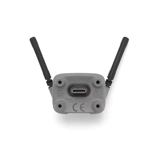 Gray rectangular dji neo 2 image transmission module with two black antennas and usb-c port for type beat music use