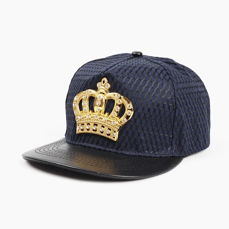 Navy blue Oohmy street cap with textured fabric crown black leather brim and gold royal king crown rhinestone emblem