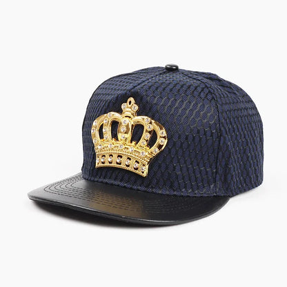 Navy blue Oohmy street cap with textured fabric crown black leather brim and gold royal king crown rhinestone emblem