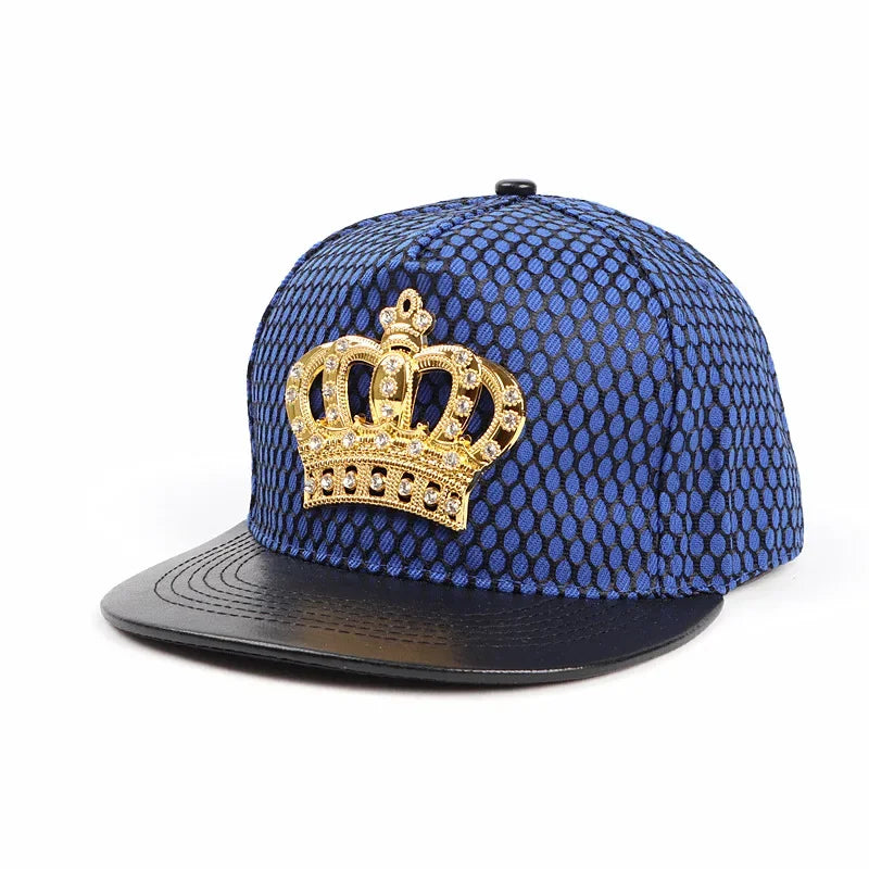 Blue mesh snapback cap with a gold rhinestone royal king crown emblem and black leather visor king crown baseball hat