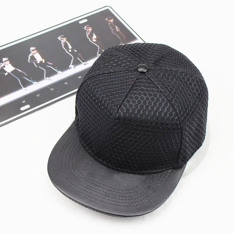 Black mesh snapback cap with flat brim and button featuring royal king crown design for men women and youth