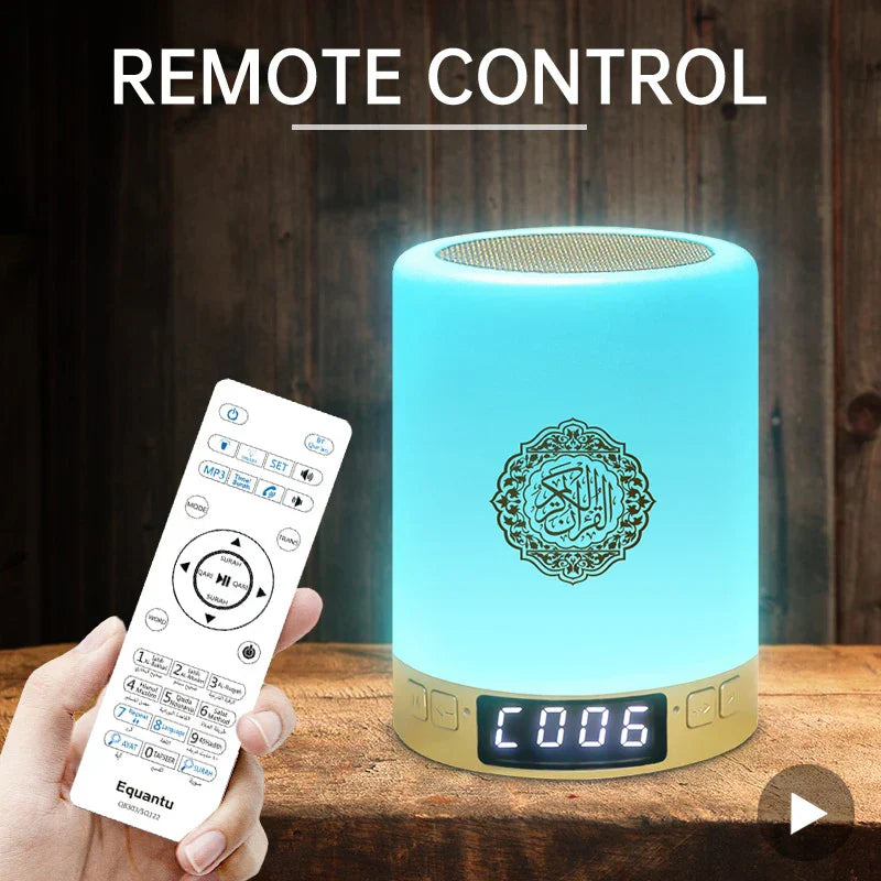 Light blue cylindrical bright quran azan with gold base koran bluetooth speaker and portable night light showing time