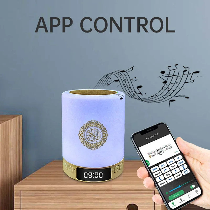 A sleek lavender bright quran azan koran bluetooth speaker with gold accents and portable night light features ornate islamic calligraphy
