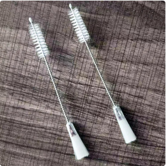 Two white plastic alto sax and clarinet flute piccolo brush saxophone clarinet cleaners with silver metal wires and bristles