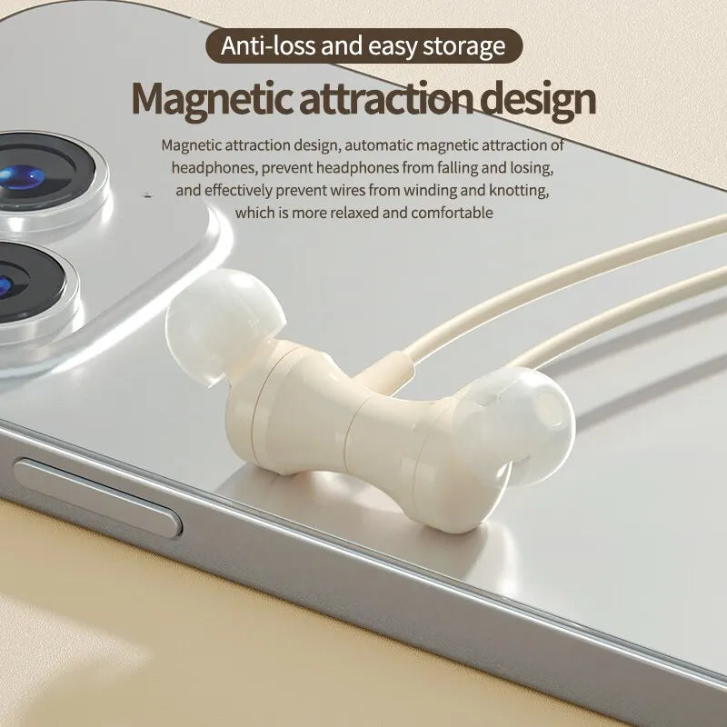 Cream-colored wireless bluetooth earphones with button control earbuds rest on a silver smartphone outdoor sports headset