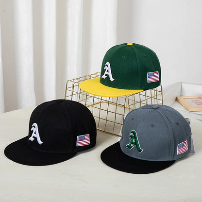 Hip-hop style baseball cap with a flat top, color patching, letter embroidery. Suitable for both women and men