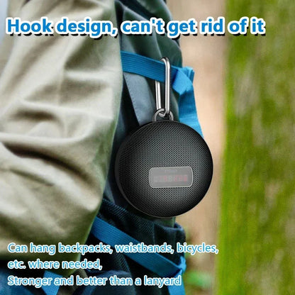 Black som bluetooth speaker with textured mesh surface and metallic hook wireless mini subwoofer for outdoor use