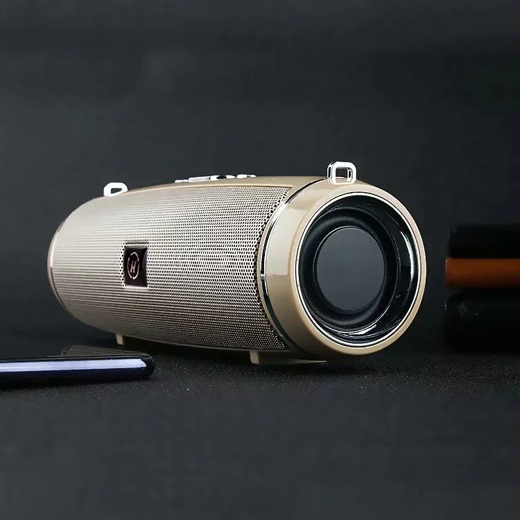 Gold-colored cylindrical som portable wireless speaker bluetooth 200w with mesh grille and silver accents for high power outdoor use