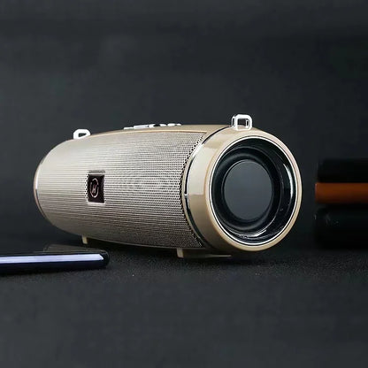 Gold-colored cylindrical som portable wireless speaker bluetooth 200w with mesh grille and silver accents for high power outdoor use