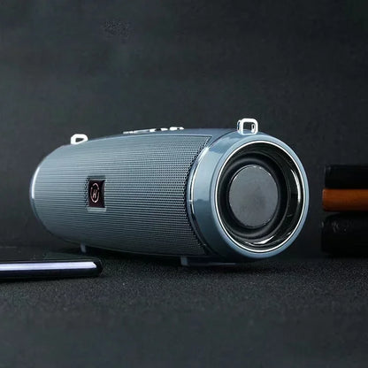 Gray cylindrical som portable wireless speaker bluetooth 200w with mesh grille and metallic silver accents for high power outdoor use