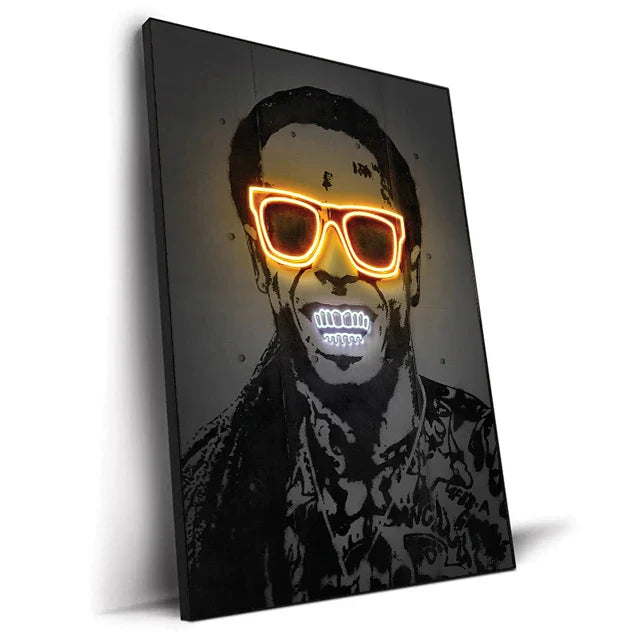 A black-framed canvas print featuring a stylized portrait of a man with glowing orange neon sunglasses and white led teeth