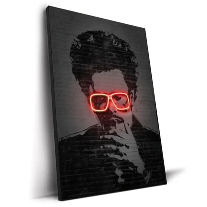 Black canvas print featuring a stylized portrait of a man with glowing red neon glasses against a brick wall background