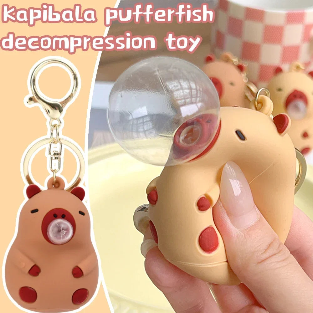 Beige and red capybara doll pinch spit bubble decompression toy keychain with clear bubble schoolbag doll pendant decoration