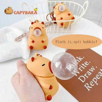 Orange capybara doll pinch stress ball with red spots and clear spit bubble for decompression and schoolbag doll pendant