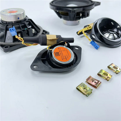 Black plastic car rear surround tweeter components with orange silver labels yellow wiring and blue connectors for bmw e90 e91 e60 e61 f10 f11 f90 f07 backside