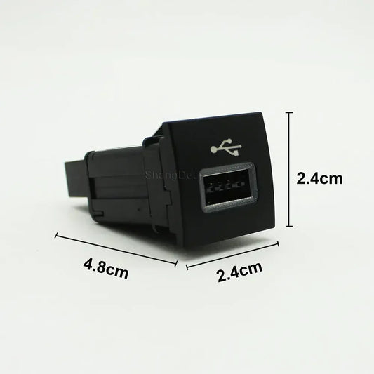Black plastic car usb input adapter with silver insert and white usb symbol for jetta mk5 caddy flash socket interface