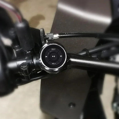 Black circular remote control car knob with silver trim and buttons for ios android control car kit use