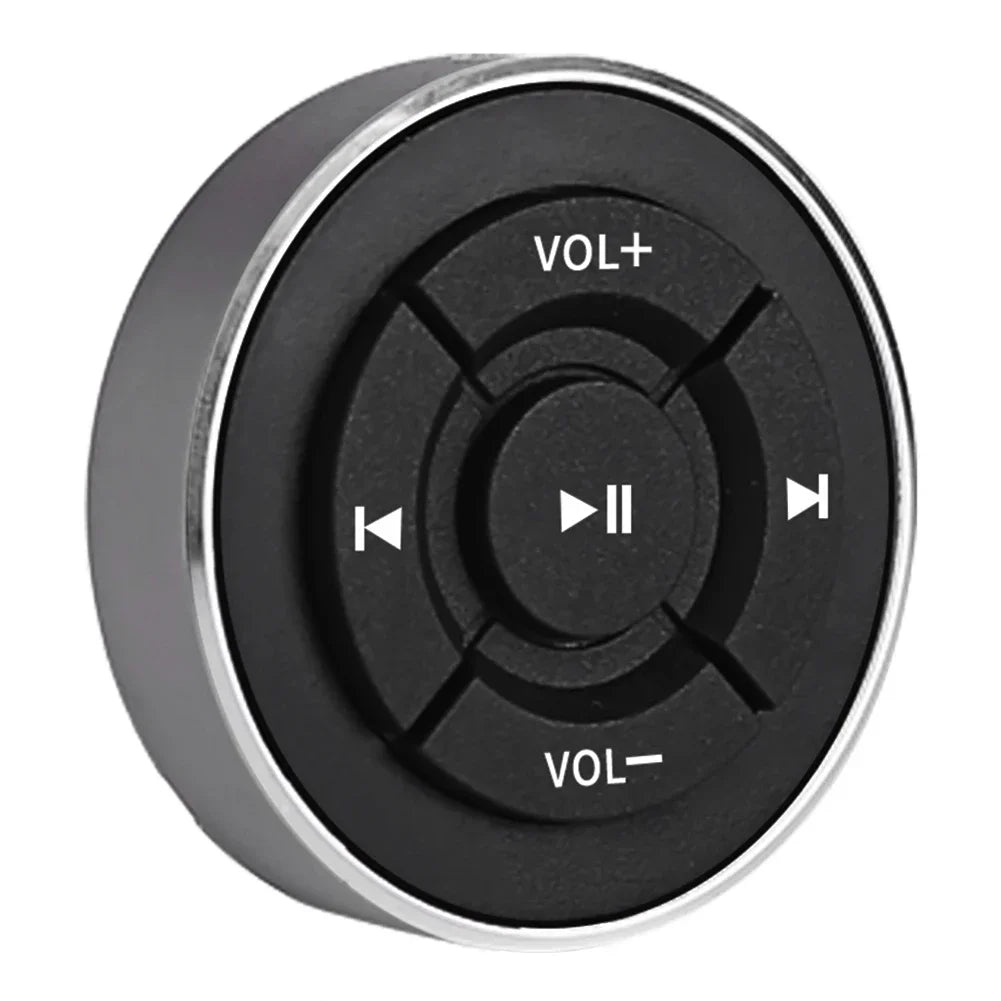 Black circular wireless bluetooth remote control car button with silver rim and white media icons for ios android use