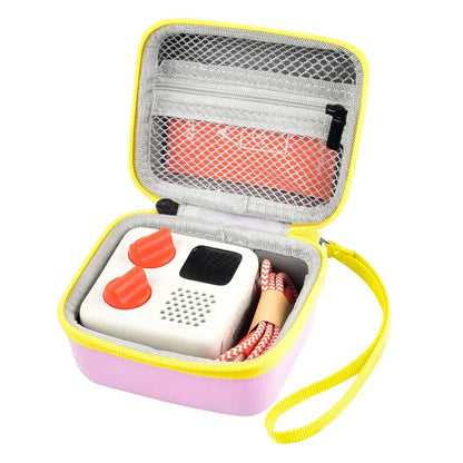 Pink and yellow protective storage holder carrying case for yoto mini player with white device that plays audiobook card