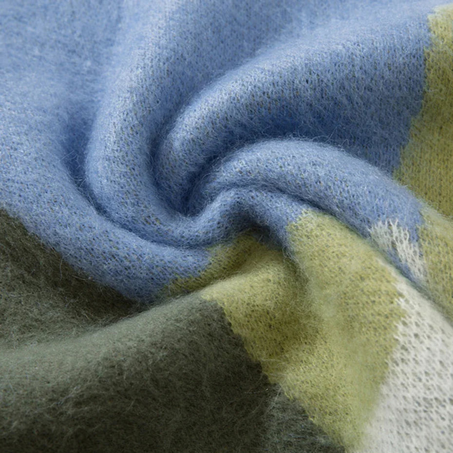 Soft fuzzy knit scarf with light blue olive green and cream stripes paired with oversized hip hop pullover sweater