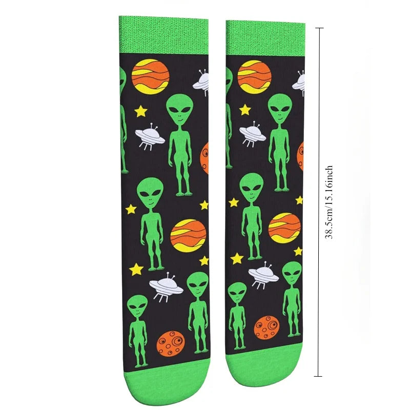 Green cavertin men’s programming alien sasquatch socks with orange and yellow ufos planets on black background